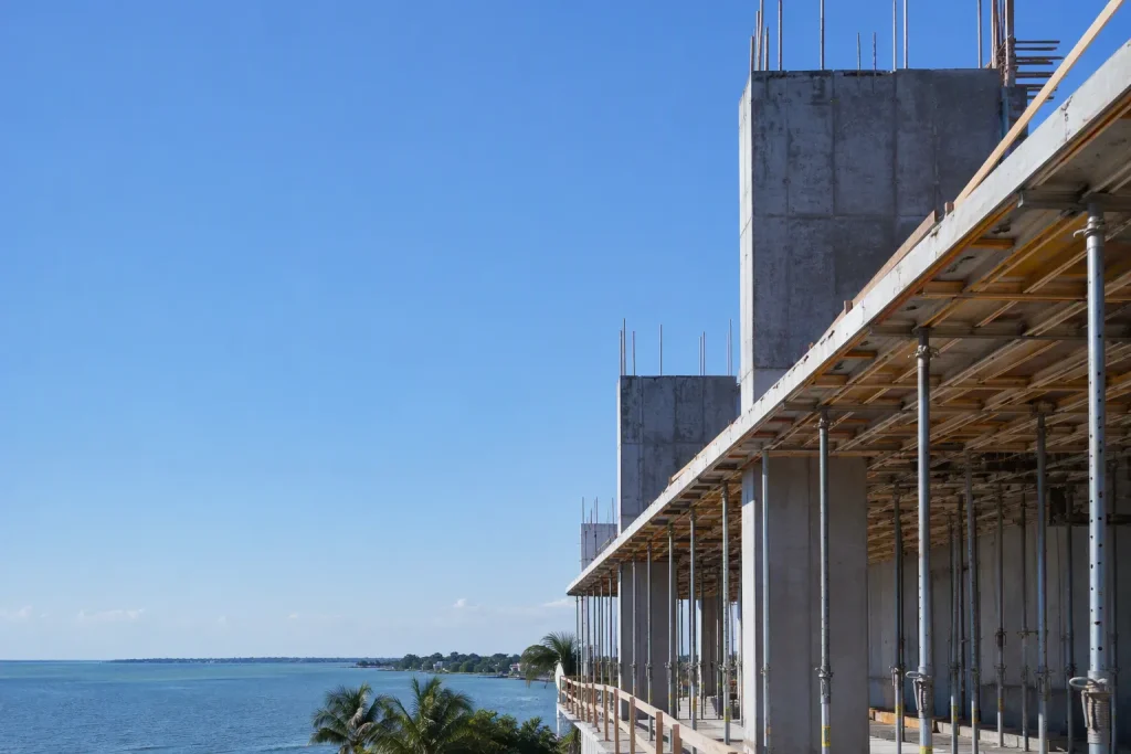 Shoring inspections in Stuart FL for elevated concrete slab formwork under a South Florida sky.