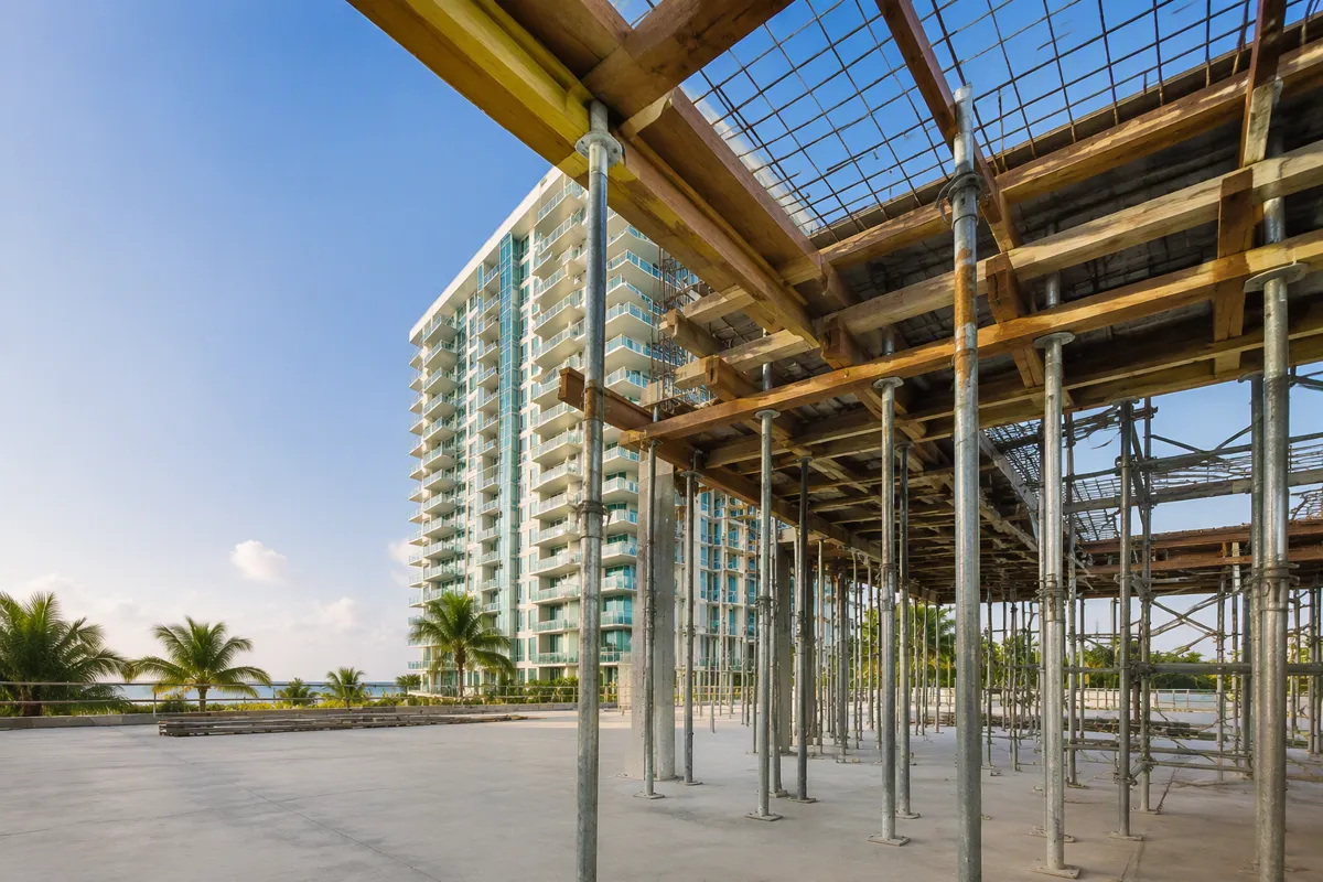Shoring inspections in Stuart FL for elevated concrete slab formwork under a South Florida sky.
