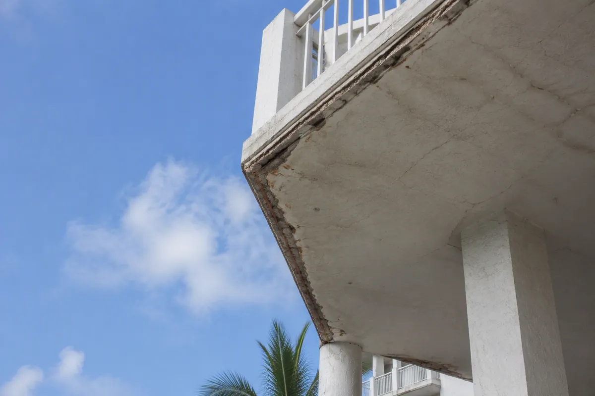 Balcony inspection Florida: oceanfront condo tower with weathered balconies